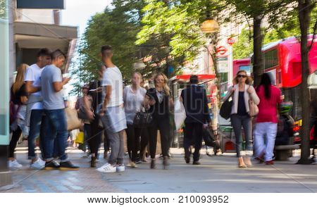 LONDON, UK - June 9, 2017: Blurred image group of walking people at Oxford street, the main destination for shopping at Westend.