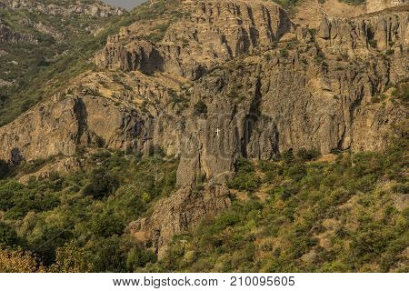 The ancient Christian temple Geghard in the mountains of Armenia