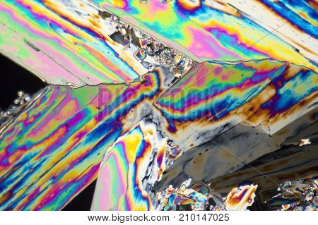 microscopic shot of urea micro crystals in polarized light