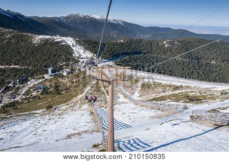 NAVACERRADA - JANUARY 4 2015: Chair lift in Navacerrada Ski Resort Navacerrada Mountain Pass Madrid Spain on January 4 2015.