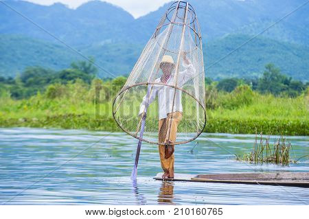 INLE LAKE MYANMAR - SEP 07 : Burmese fisherman at Inle lake Myanmar on September 07 2017 inle Lake is a freshwater lake located in Shan state