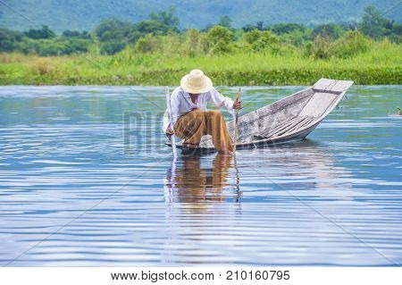 INLE LAKE MYANMAR - SEP 07 : Burmese fisherman at Inle lake Myanmar on September 07 2017 inle Lake is a freshwater lake located in Shan state