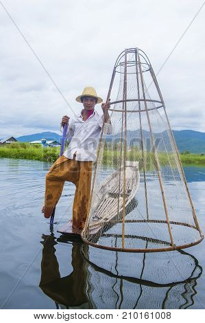 INLE LAKE MYANMAR - SEP 07 : Burmese fisherman at Inle lake Myanmar on September 07 2017 inle Lake is a freshwater lake located in Shan state