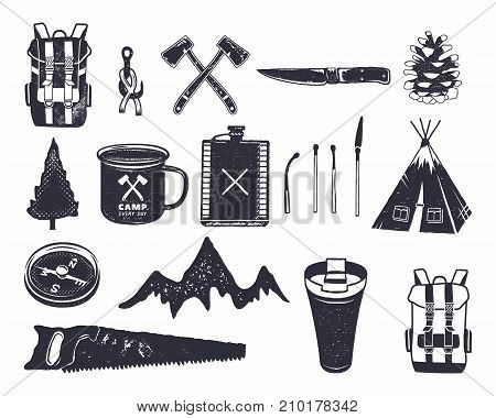 Vintage hand drawn adventure hiking, camping shapes of backpack, saw, mountain, matches, tree, knife, thermo cup and others. Retro monochrome design. Can be used for t shirts, prints. Stock .