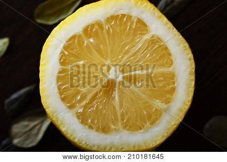 A cup of lemona cup of lemon on a wooden table