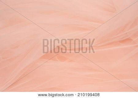 Beautiful layers of gentle pink background with tulle fabric clothes