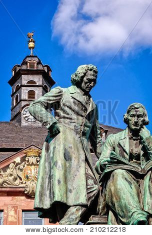 Statue looking down at the market square, Hanau, Germany
