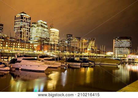 View of Puerto Madero dock in Buenos Aires, Argentina at night.