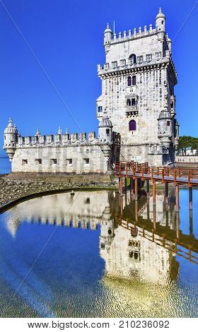 Belem Tower Torre de Belem Portuguese Symbol of Exploration Reflection Lisbon Portugal. Belem Tower was constructed in early 1500s on Tagus River and last point Portguese explorers saw when left Lisbon.