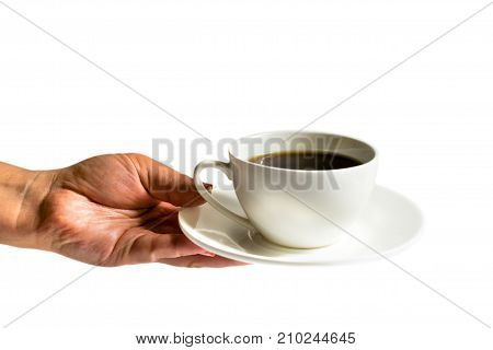 Cup of coffee, holding a woman's hand on white background, isolated.