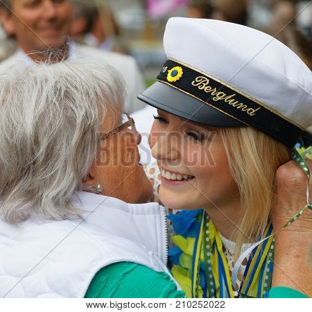 STOCKHOLM SWEDEN - JUN 13 2017: Proud grandmother hugging her graduating daughter at the dance school Balettakademien June 13 2017StockholmSweden