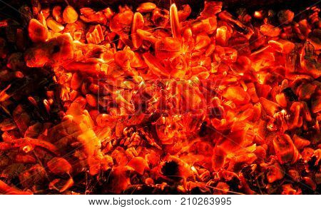 background of burning coals . Photo of an abstract texture