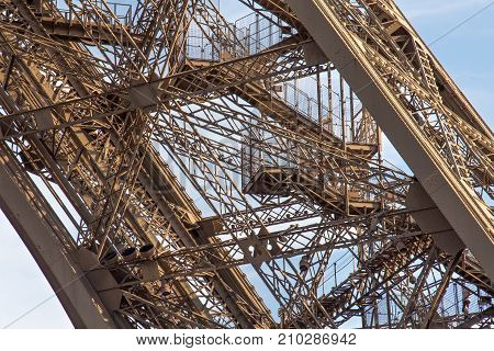 Stairs of the Eiffel Tower in Paris. France. The Eiffel Tower was constructed from 1887-1889 as the entrance to the 1889 World's Fair by engineer Gustave Eiffel.