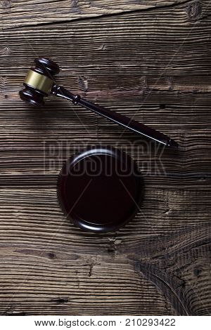 Gavel. Auction and business concept.  Gavel on the wooden background.