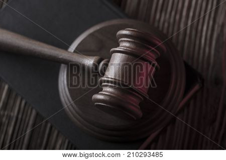 Gavel. Auction and business concept.  Gavel on the wooden background.