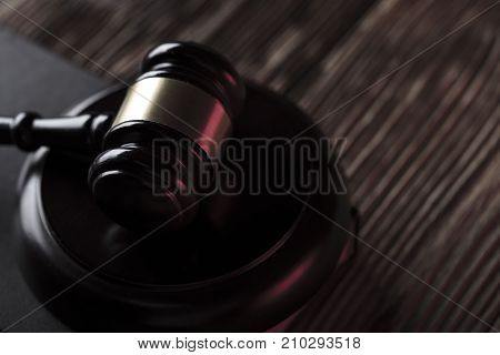 Gavel. Auction and business concept.  Gavel on the wooden background.
