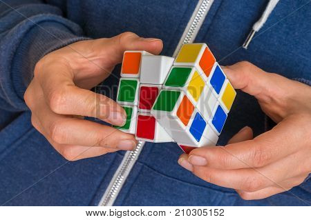 Rubik's Cube In Female Hands - Game For Solving Problems