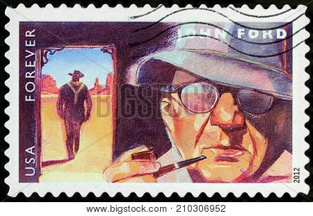 LUGA RUSSIA - APRIL 26 2017: A stamp printed by USA shows image porttrait of famous American film director John Ford circa 2012