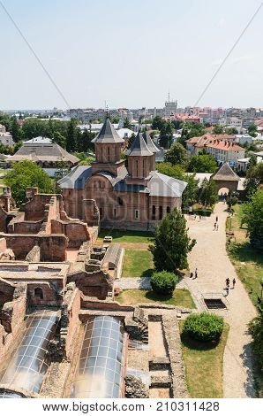 Targoviste Romania - August 15 2017: Aerial view of the Princely Court showing St. Friday Church in Targoviste Dambovita Romania - vertical