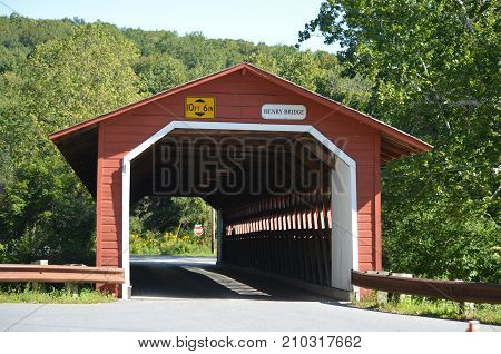 A red wooden covered bridge in Vermont