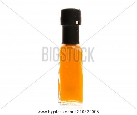 Hot Chili Sauce Glass Bottle On White Background.