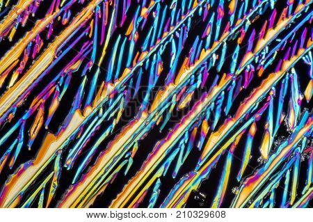 colorful microscopic shot of Sodium nitrate microcrystals in polarized light