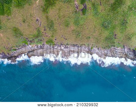 Sea aerial viewTop viewamazing nature background.The color of the water and beautifully bright.Azure beach with rocky mountains and clear water of Thailand ocean at sunny day.