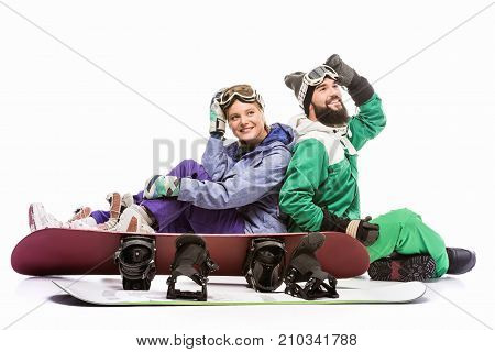 Couple In Snowboarding Costumes With Snowboards