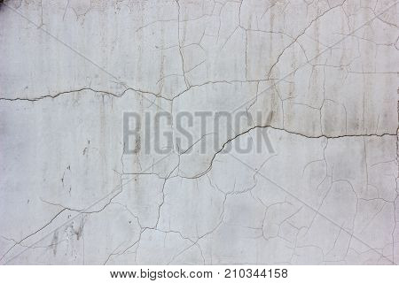 Old weathered concrete wall texture with number of scratches