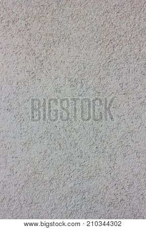 Concrete wall texture. Wheathered plaster background grey color