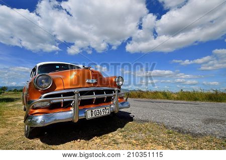ANCON BEACH CUBA - 09 NOVEMBER 2016: Classical old car on the route leading to Cuban beaches