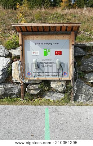 KATSCHBERG/ AUSTRIA - OCTOBER 11, 2017. E-vehicle charging station at the public parking of the ski resort Katschberg. Carinthia, Austria