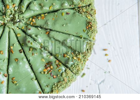 Close up green sliced pistachio cake top view