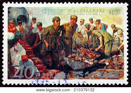 NORTH KOREA - CIRCA 1990: a stamp printed in North Korea shows postwar reconstruction circa 1990