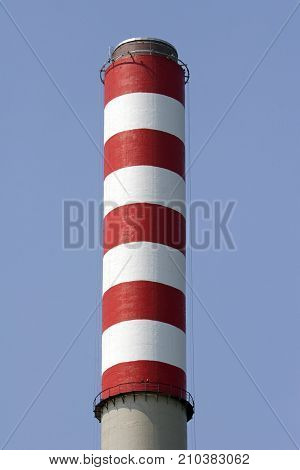 Renewed and fresh red and white painted chimney of power plant Sisak in Croatia