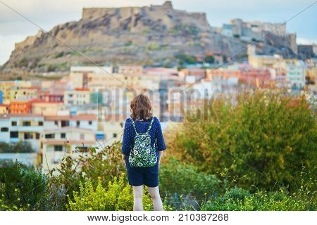 Girl Enjoying View To Castelsardo Village In Sardinia, Italy