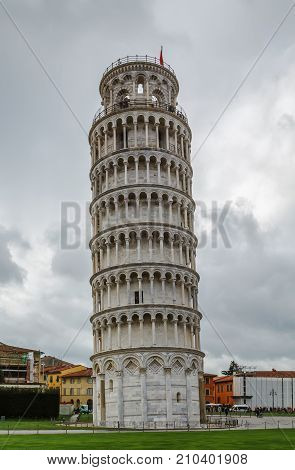 The bell tower commonly known as the Leaning Tower of Pisa is located on Piazza dei Miracoli in Pisa Italy
