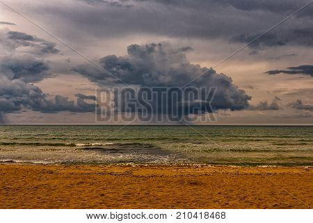 Rain clouds on the Ionian Sea at the southeast coast of Sicily Avola Italy