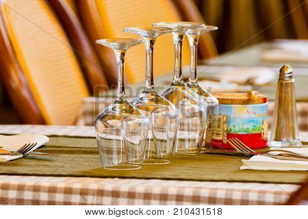 Empty Wine Glasses On The Table Served For Lunch, Dinner In Cafe, Restaurant Outside Or On Terrase
