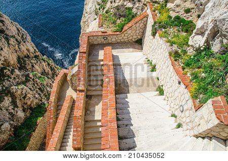 Stairways to Neptune Cave in Capo Caccia near Alghero, Province of Sassari, Sardinia, Italy.