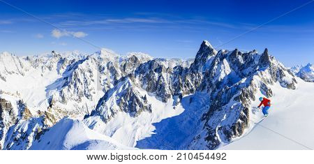 Skiing Vallee Blanche Chamonix with amazing panorama of Grandes Jorasses and Dent du Geant from Aiguille du Midi, Mont Blanc mountain, Haute-Savoie, France
