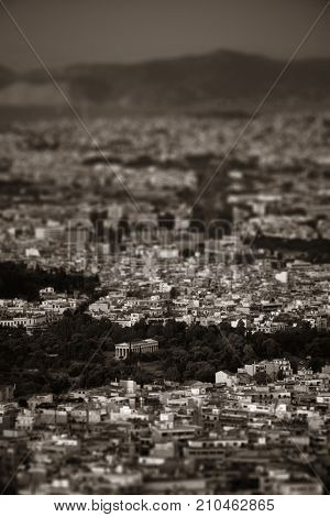 Athens skyline tilt shift viewed from Mt Lykavitos with Acropolis, Greece.