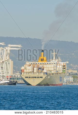 Alameda, CA - March 9, 2015: Oakland Container Shipyard, San Francisco Bay the Matson container ship 