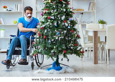 Injured disabled man celebrating christmas at home