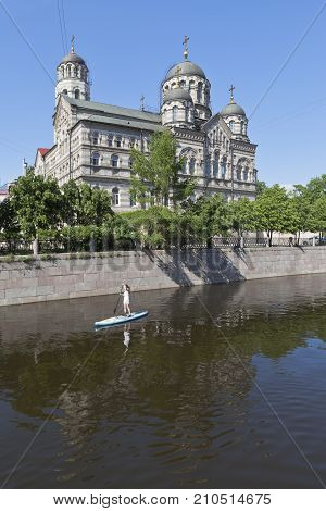 St. Petersburg, Russia - June 17, 2017: Sap Surfing on the Karpovka River opposite St. John's Convent in St. Petersburg