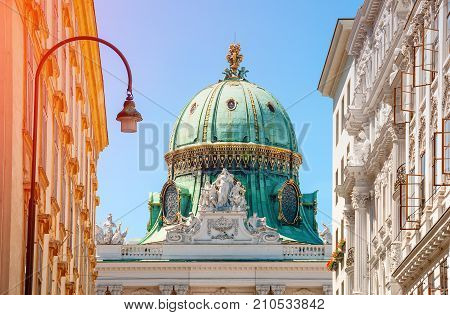 Vienna. Austria. Michaelertrakt palace Alte Hofburg in Wien. Kohlmarkt street with Hofburg Complex in downtown.