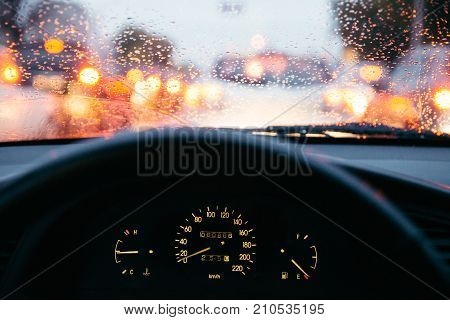 rain droplets on car windshield, blocked traffic