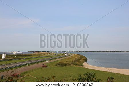 Immense Dam North Of The Netherlands With The Highway