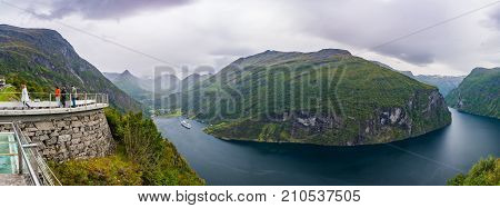 Geiranger Norway - September 5 2017: Geiranger is a 15-kilometre (9.3 mi) long branch off of the Sunnylvsfjorden which is a branch off of the Storfjorden (Great Fjord).