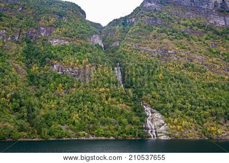 Geiranger fjord Beautiful Nature Norway. It is a 15-kilometre (9.3 mi) long branch off of the Sunnylvsfjorden which is a branch off of the Storfjorden (Great Fjord).